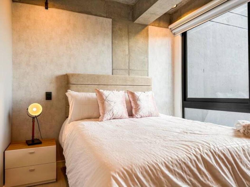 Skyline Suites - Elegant Living with Coworking & Scenic Views