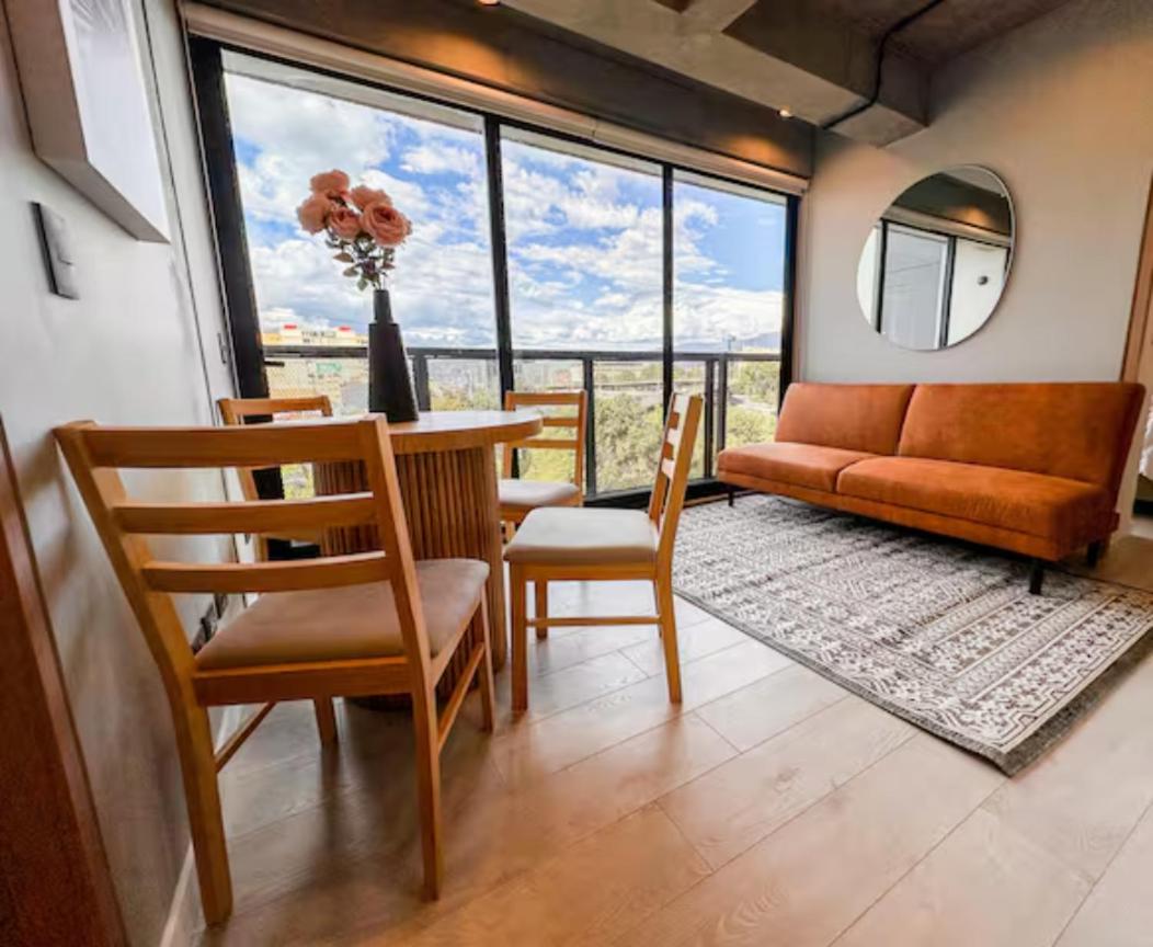 Skyline Suites - Elegant Living with Coworking & Scenic Views