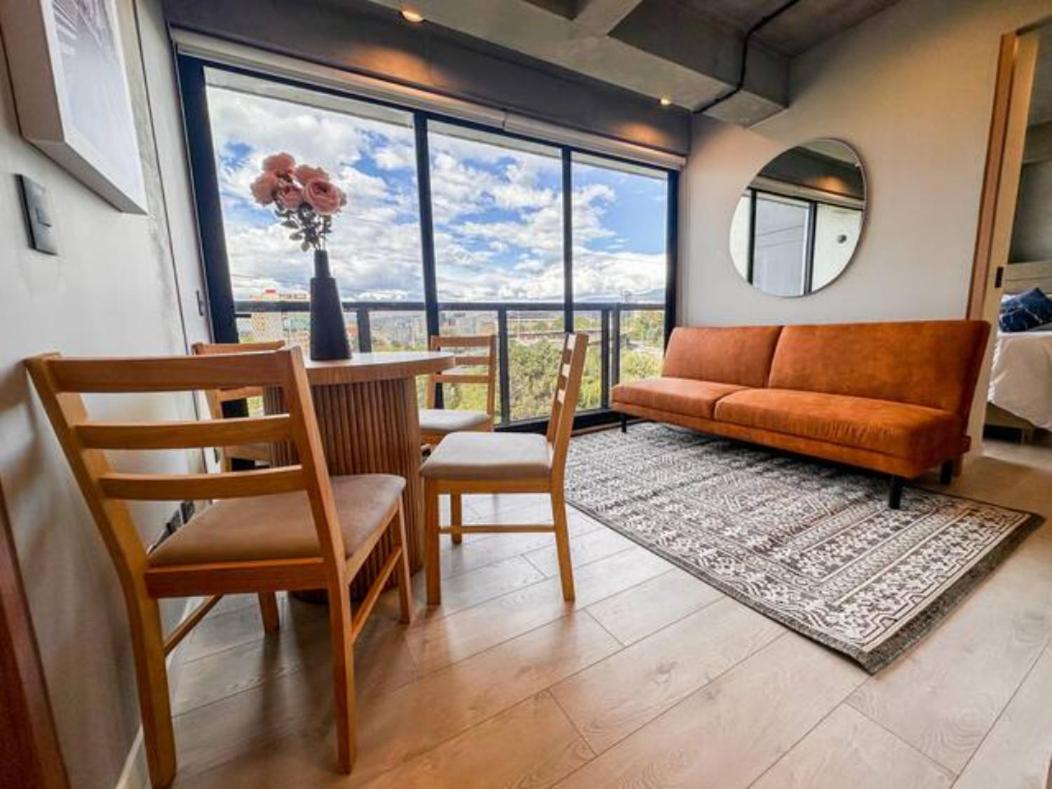 Skyline Suites - Elegant Living with Coworking & Scenic Views
