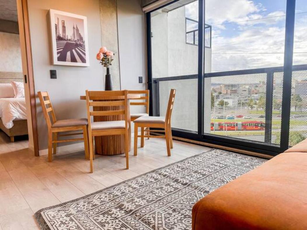 Skyline Suites - Elegant Living with Coworking & Scenic Views