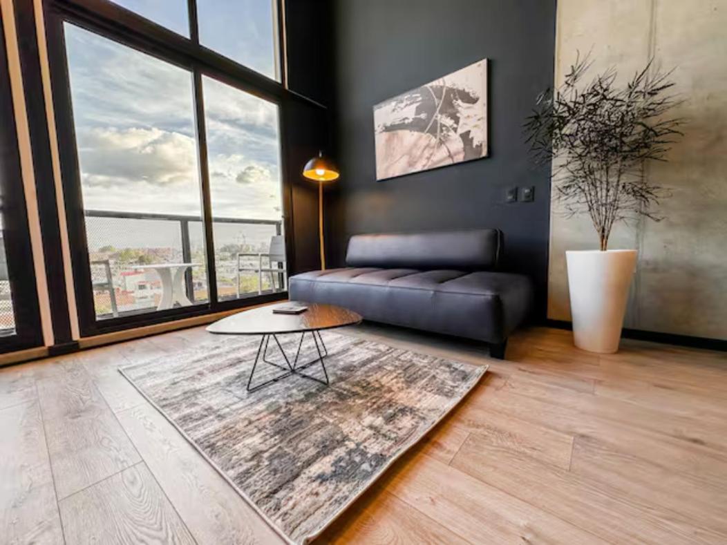 Skyline Suites - Elegant Living with Coworking & Scenic Views