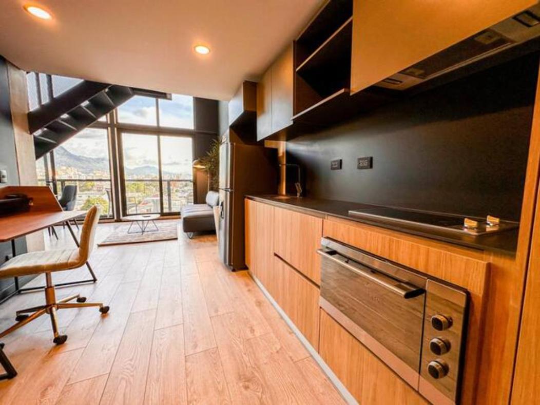 Skyline Suites - Elegant Living with Coworking & Scenic Views