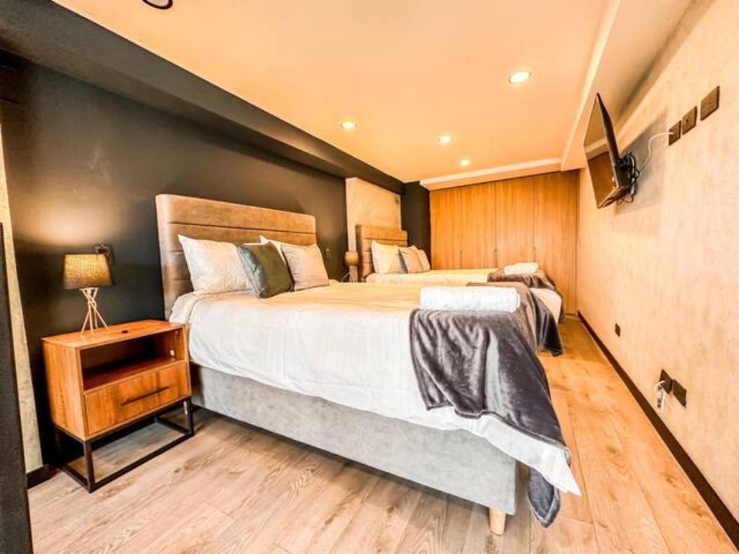 Skyline Suites - Elegant Living with Coworking & Scenic Views