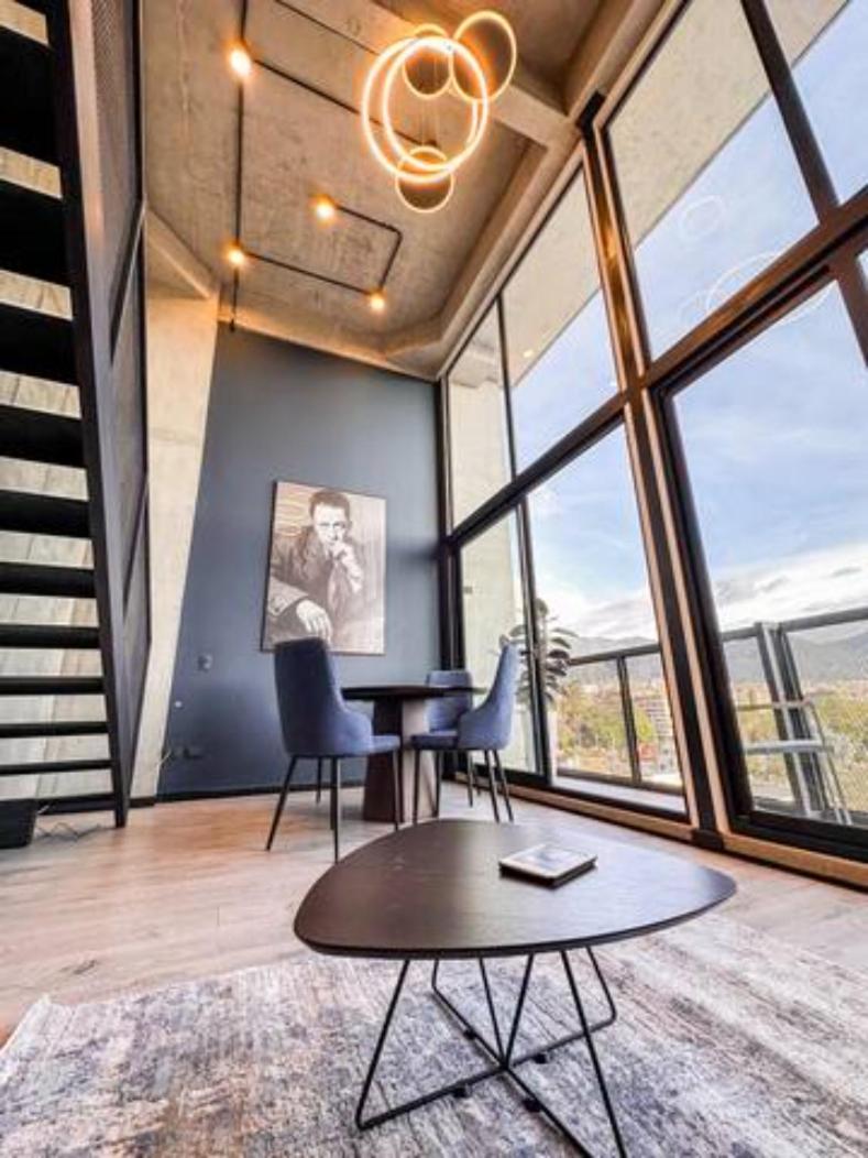 Skyline Suites - Elegant Living with Coworking & Scenic Views