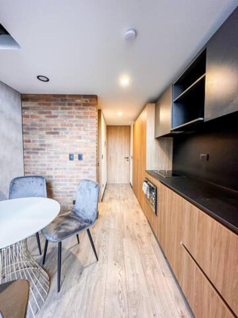 Skyline Suites - Elegant Living with Coworking & Scenic Views