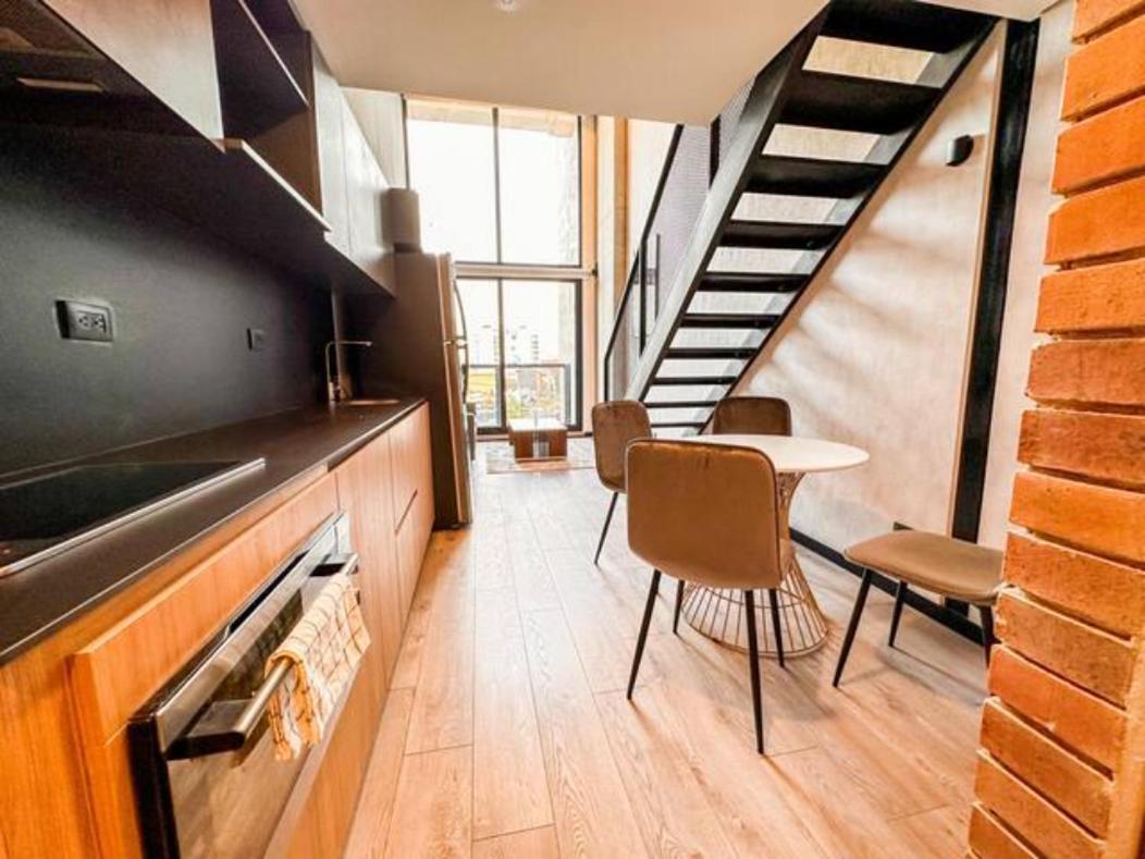Skyline Suites - Elegant Living with Coworking & Scenic Views