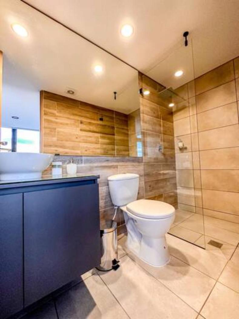 Skyline Suites - Elegant Living with Coworking & Scenic Views