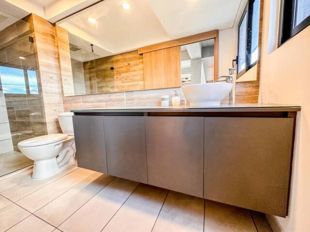 Skyline Suites - Elegant Living with Coworking & Scenic Views