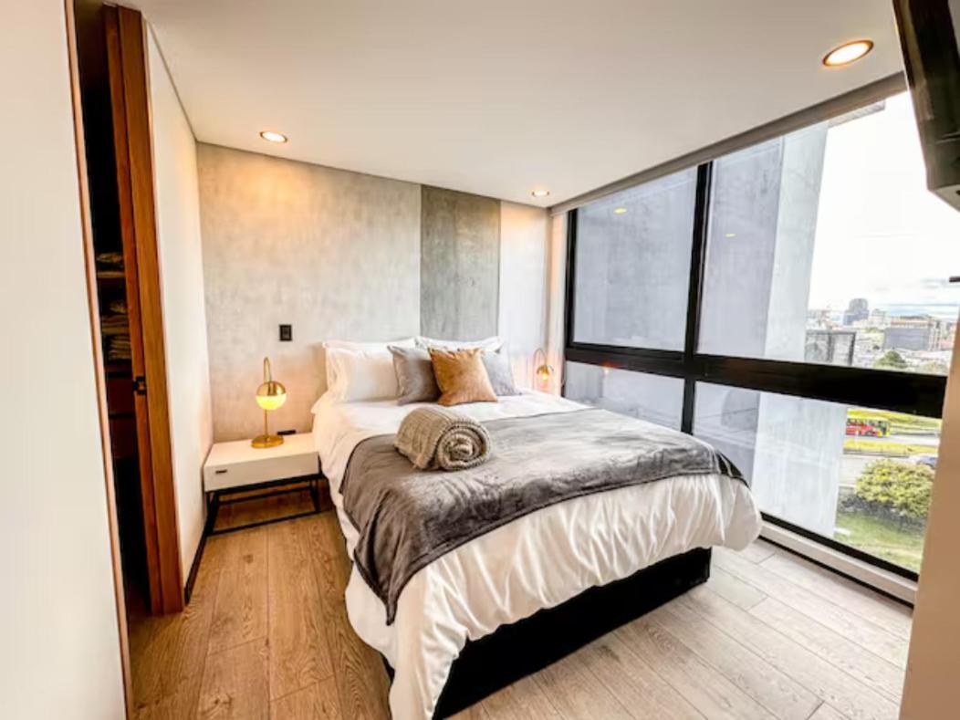 Skyline Suites - Elegant Living with Coworking & Scenic Views