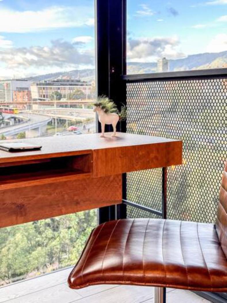 Skyline Suites - Elegant Living with Coworking & Scenic Views