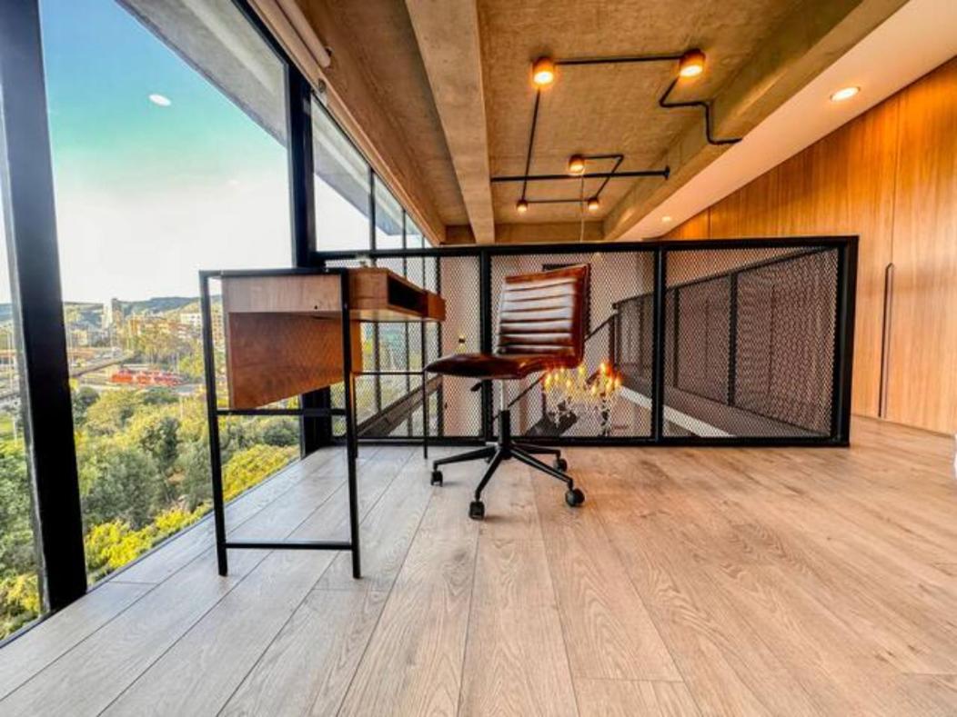 Skyline Suites - Elegant Living with Coworking & Scenic Views