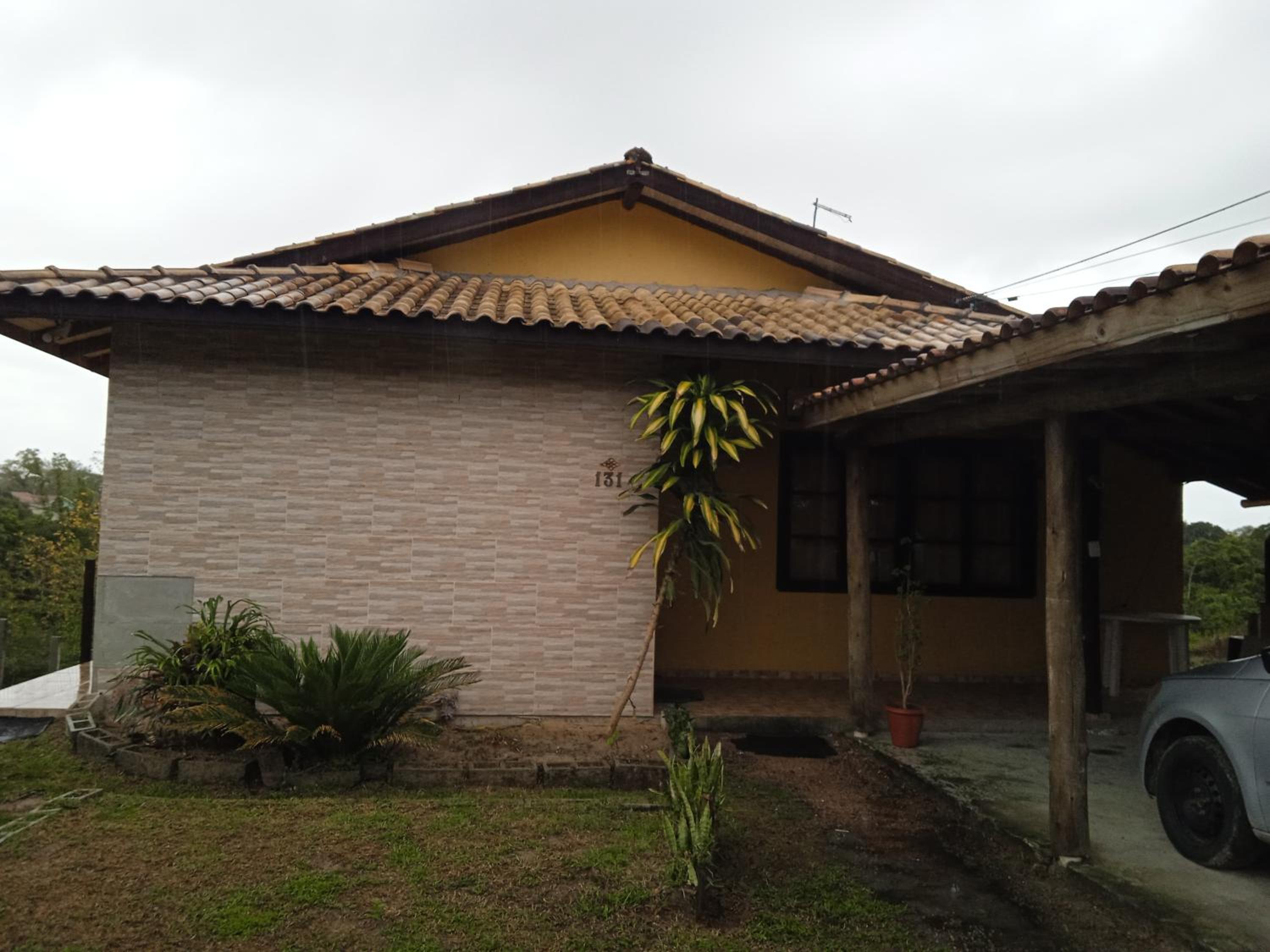 Casa amarela no Rosa