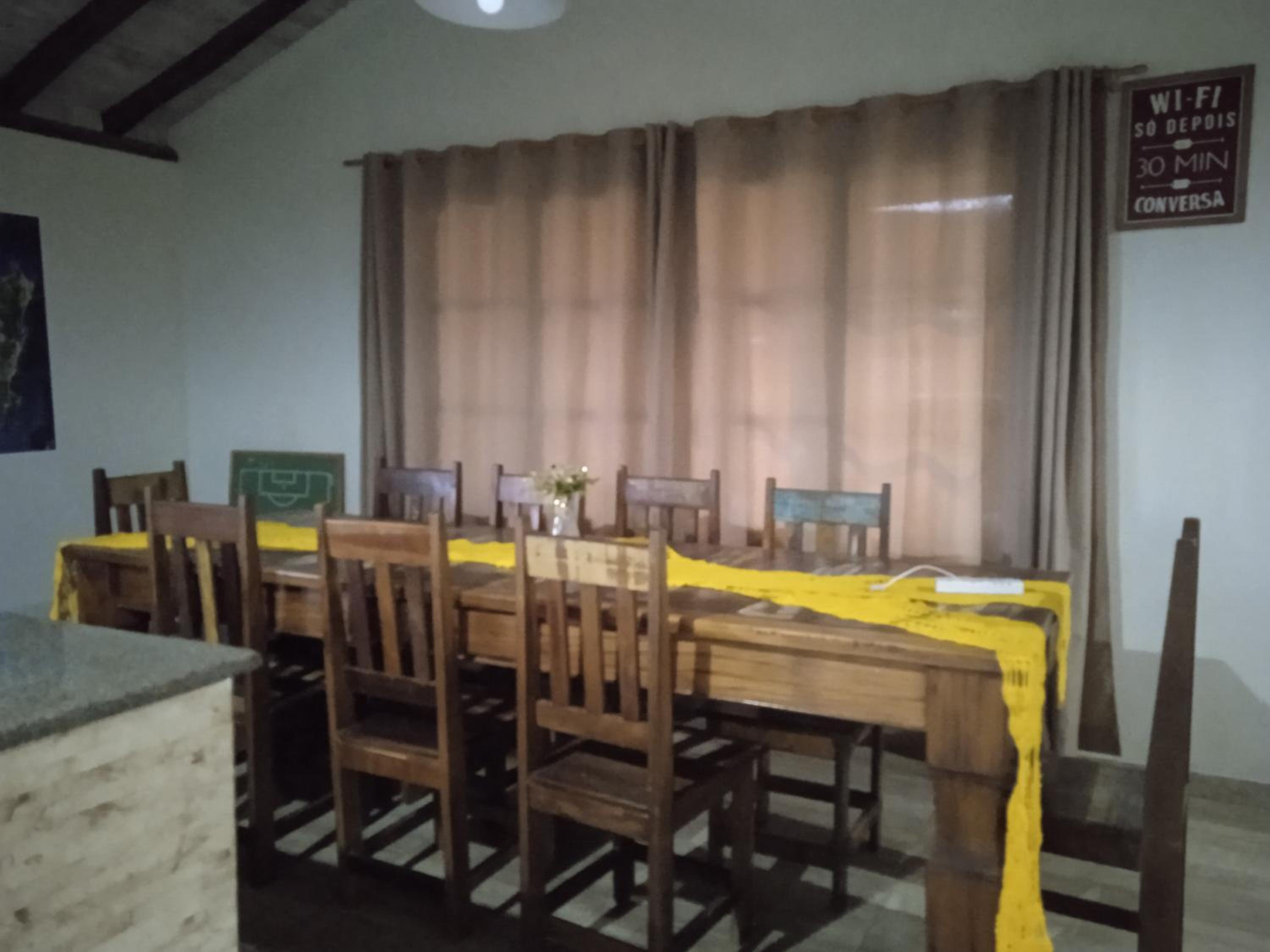 Casa amarela no Rosa