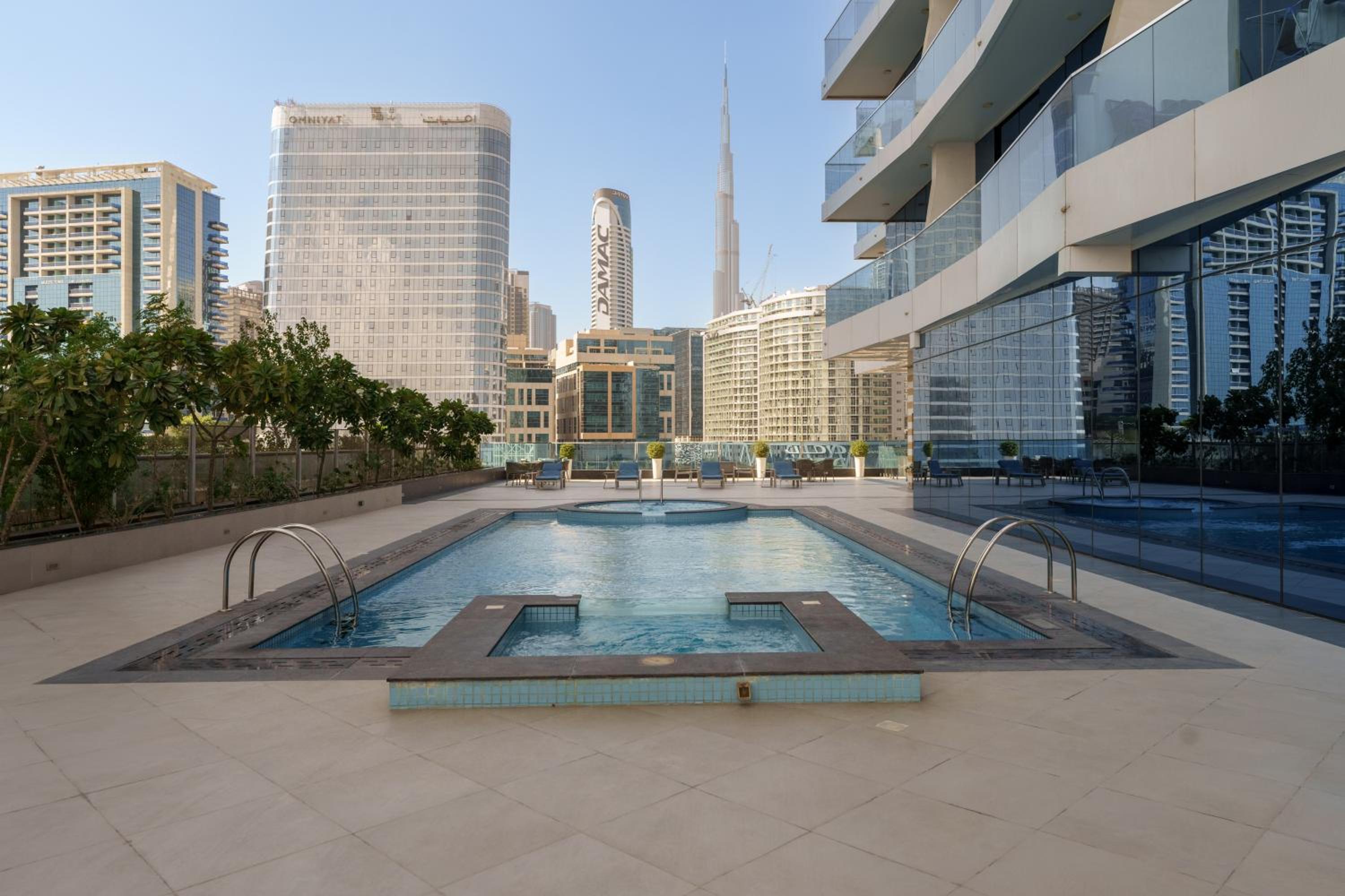 Maison Privee - Modern Business Bay Retreat with Dubai Canal Views