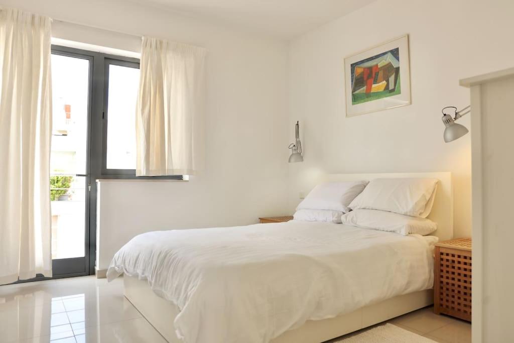 Lovely 1BR home with private balcony in St Julians by 360 Estates photo 2