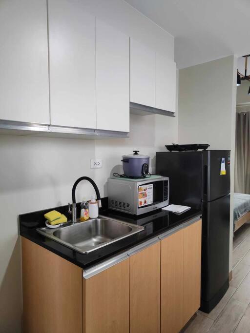 Minimalist Studio Condo Unit at One Regis view 2