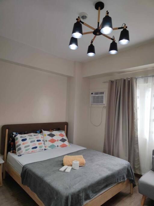 Minimalist Studio Condo Unit at One Regis view 4