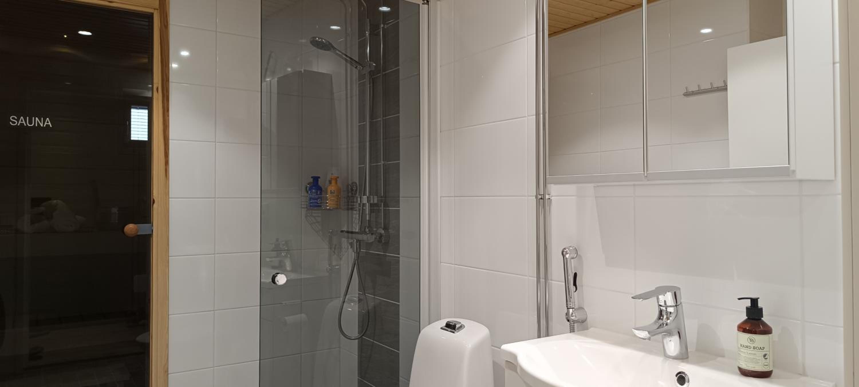 Bright and Cozy Apartment with Private Sauna And Parking