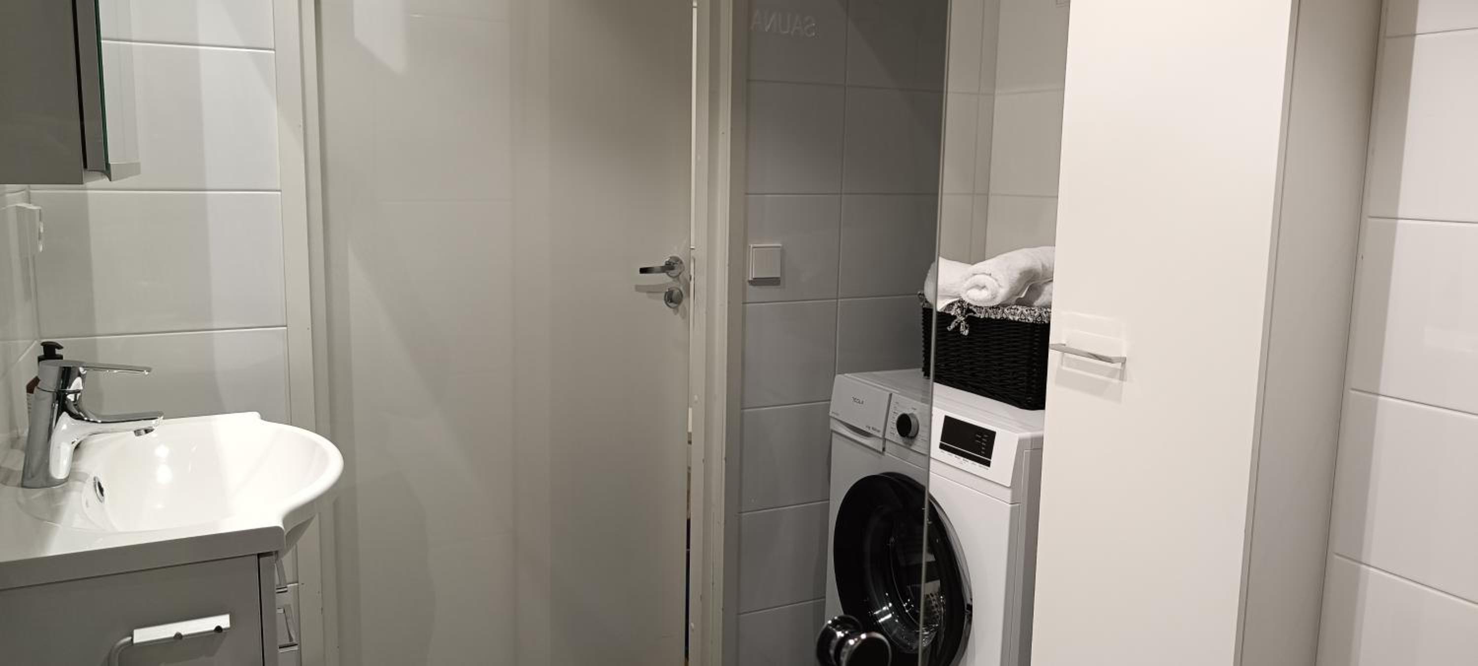 Bright and Cozy Apartment with Private Sauna And Parking