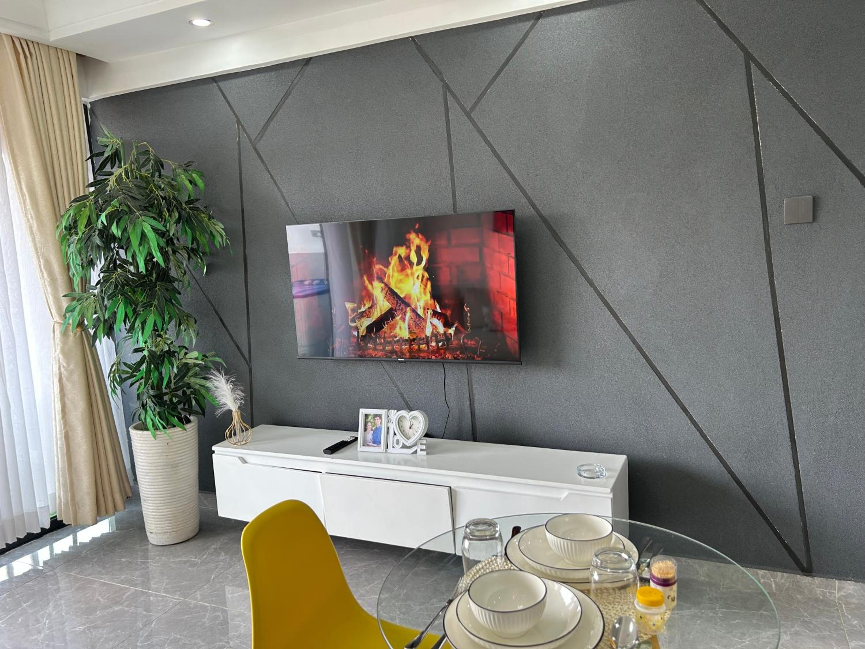 KB Gemsuites furnished apartment with a gym view 4