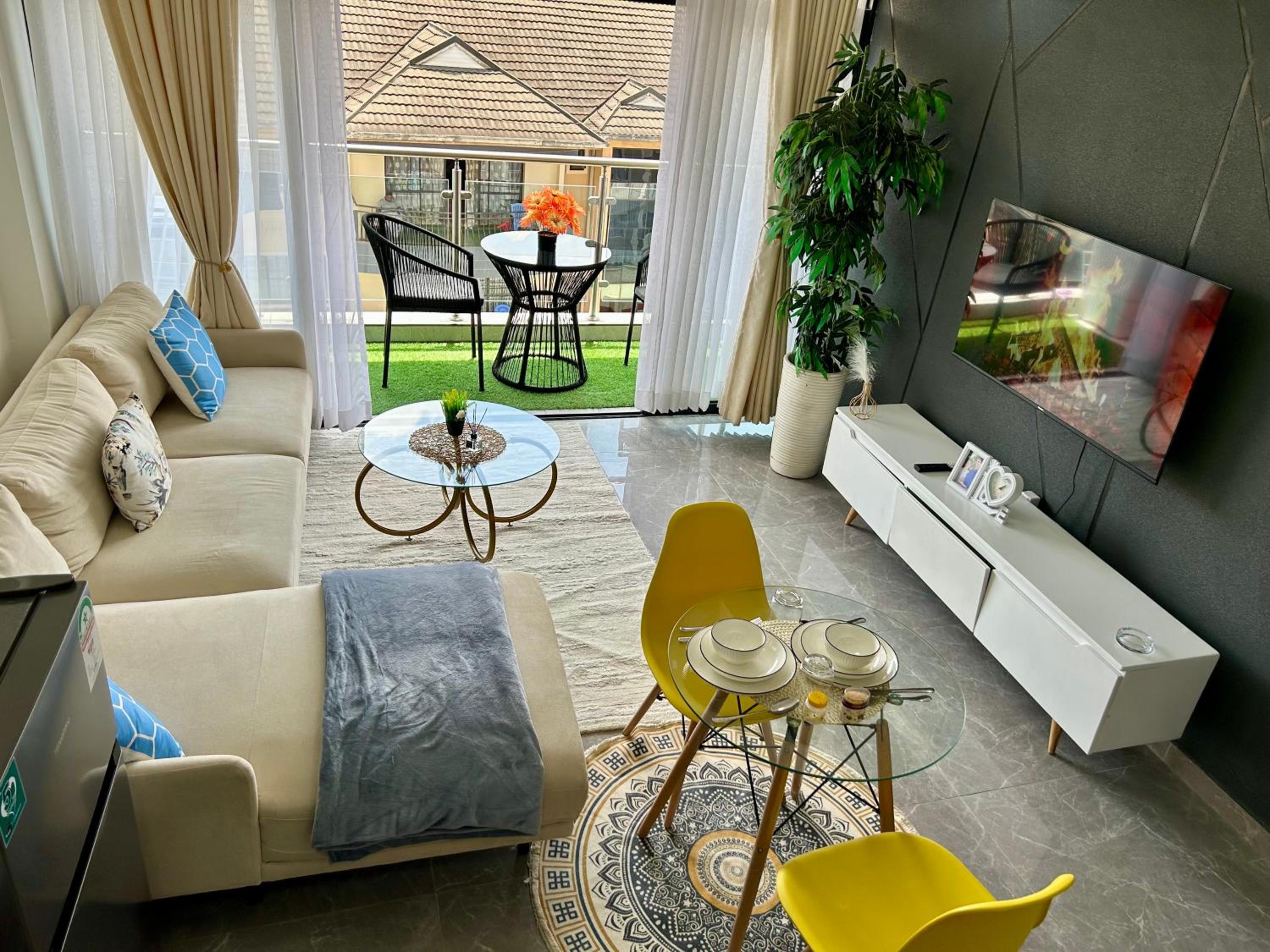 KB Gemsuites furnished apartment with a gym view 5