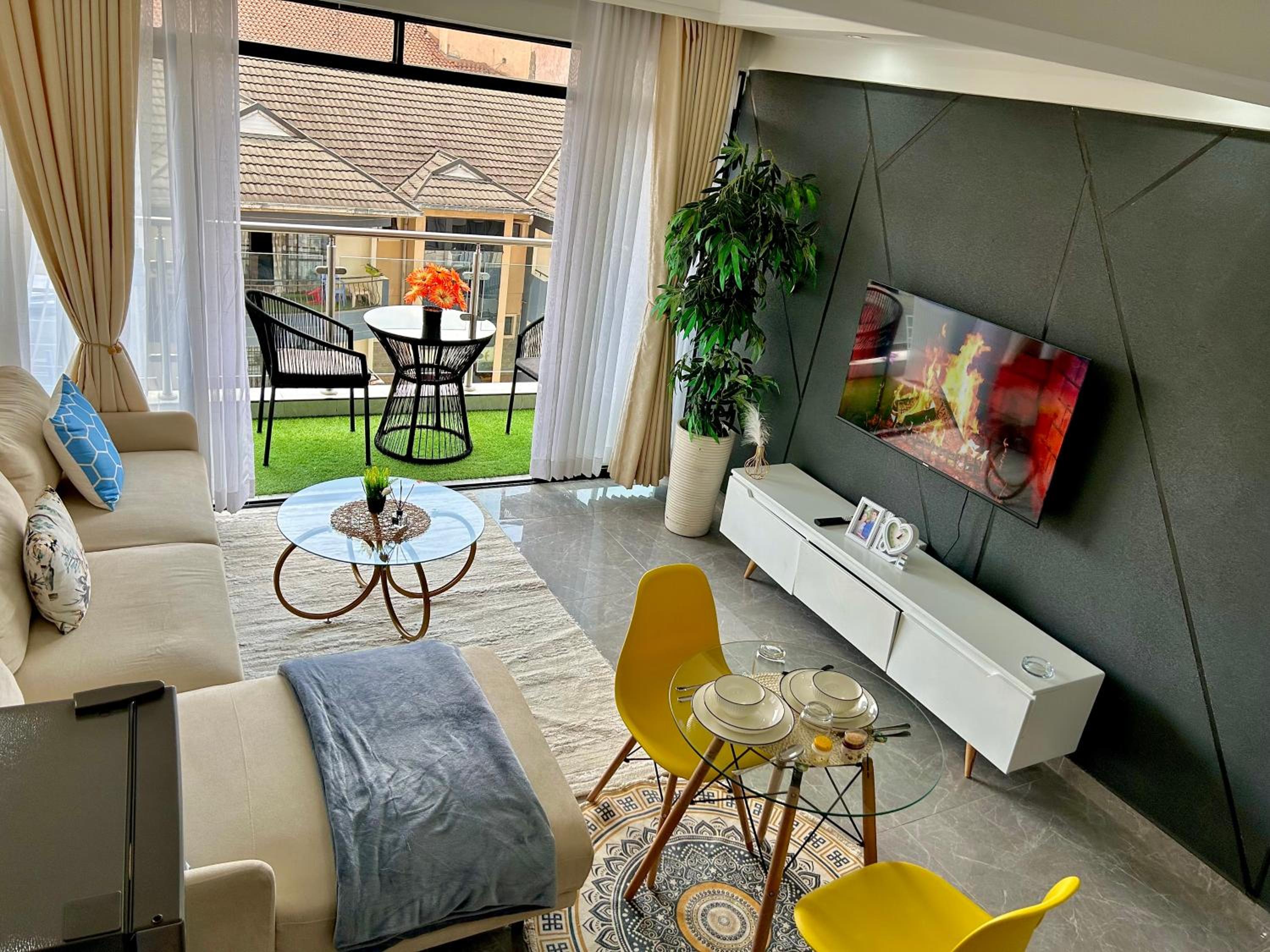 KB Gemsuites furnished apartment with a gym view 3