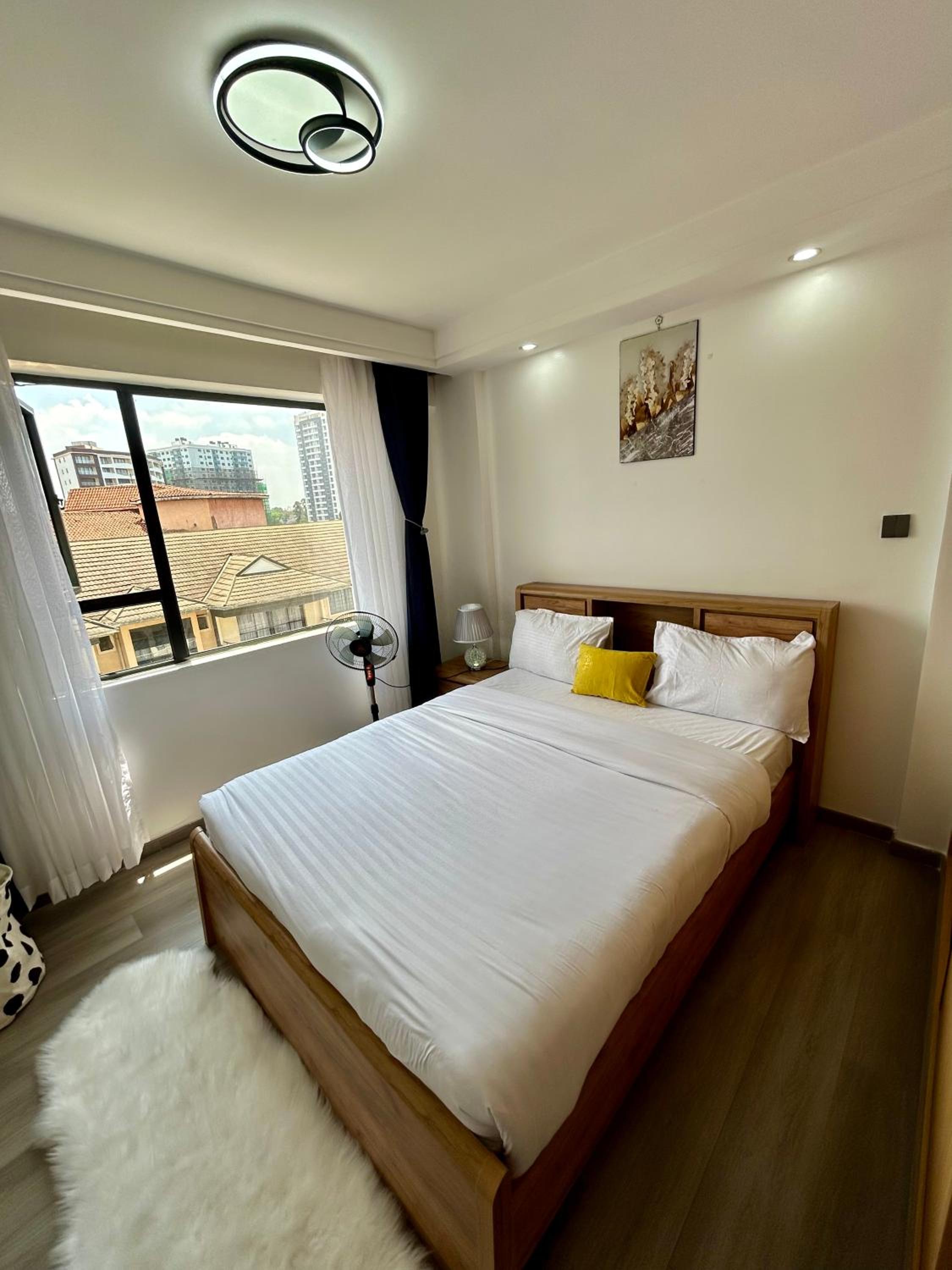 KBsuites 1BD apartment with a gym view 2