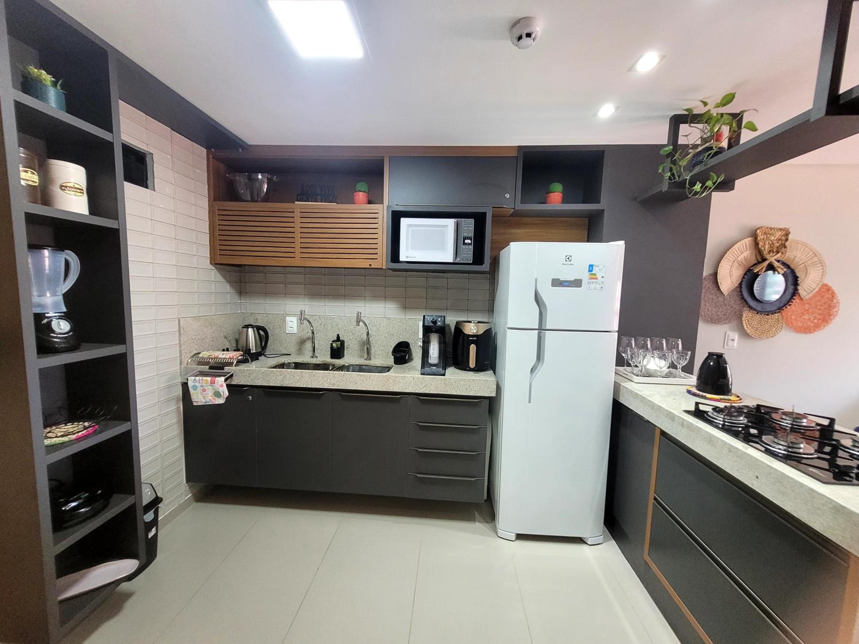 Flat com dois quartos na praia do Cabo Branco - climatizado e completo