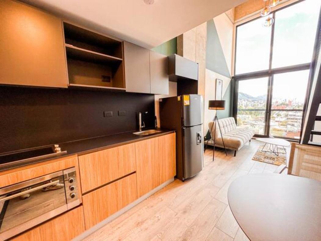 Skyline Suites - Elegant Living with Coworking & Scenic Views