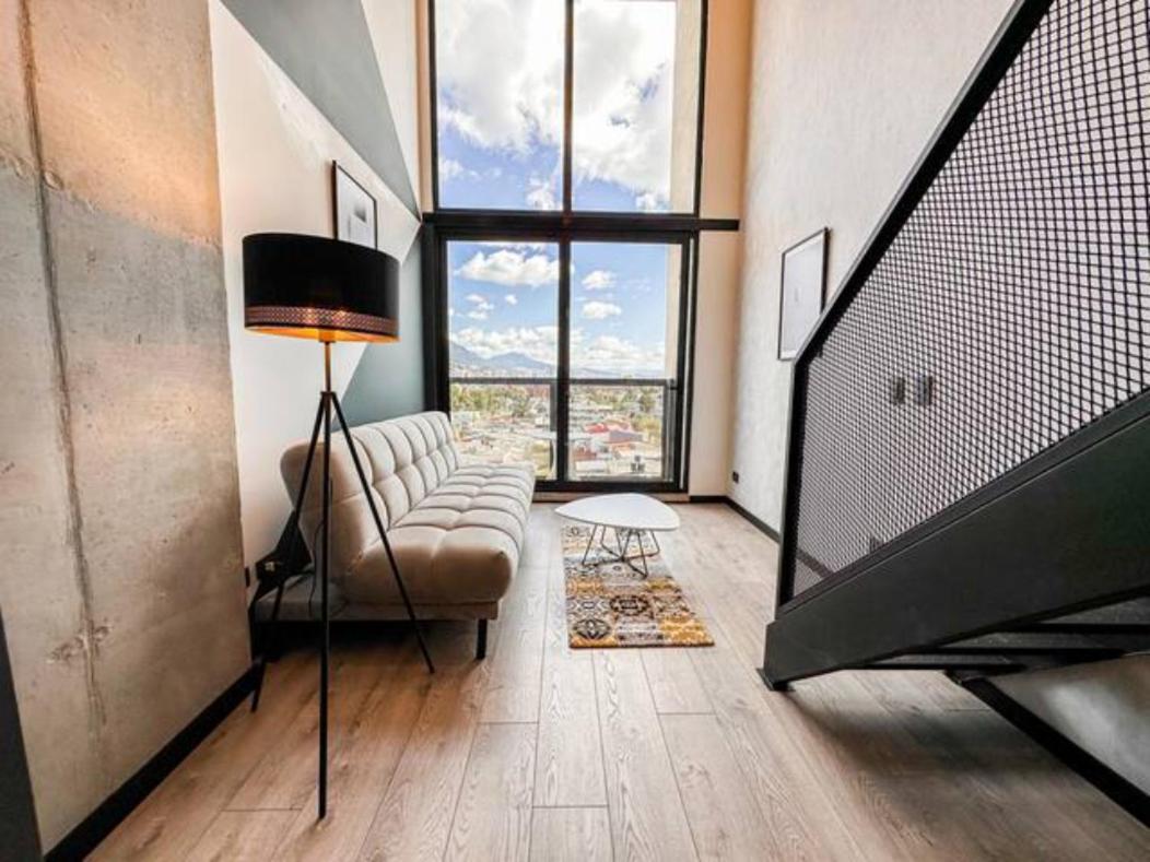 Skyline Suites - Elegant Living with Coworking & Scenic Views
