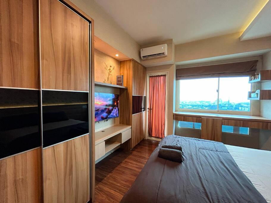 Tranquil Room at Scientia Residences with Pool View