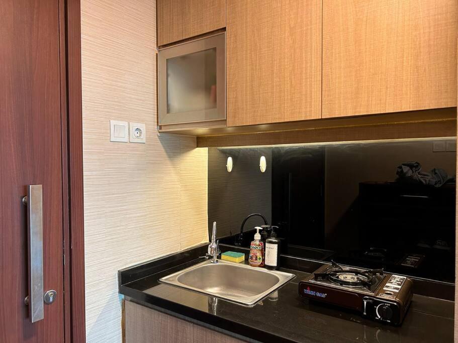 Tranquil Room at Scientia Residences with Pool View