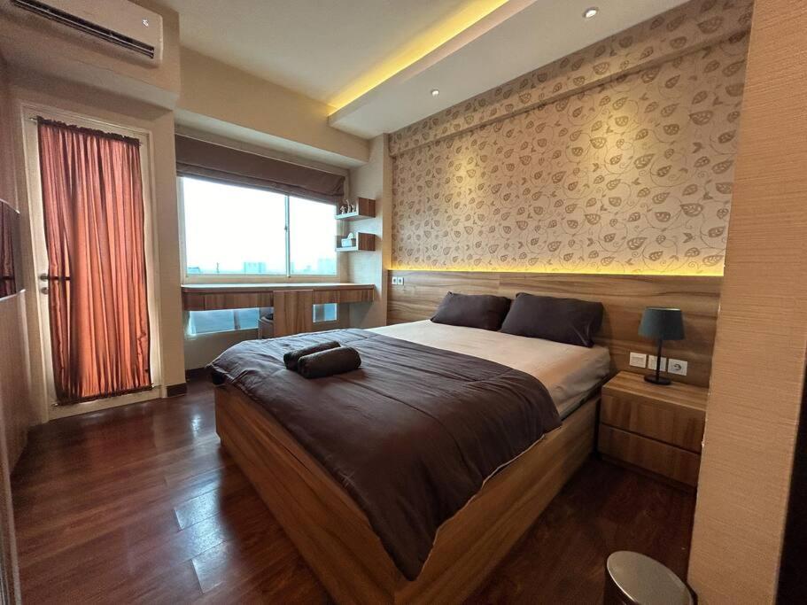 Tranquil Room at Scientia Residences with Pool View