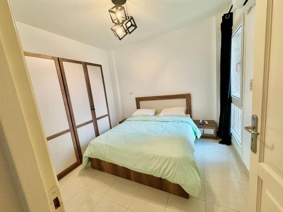 Modern2BR Amazing GardenView & Self Checkin at Madinaty