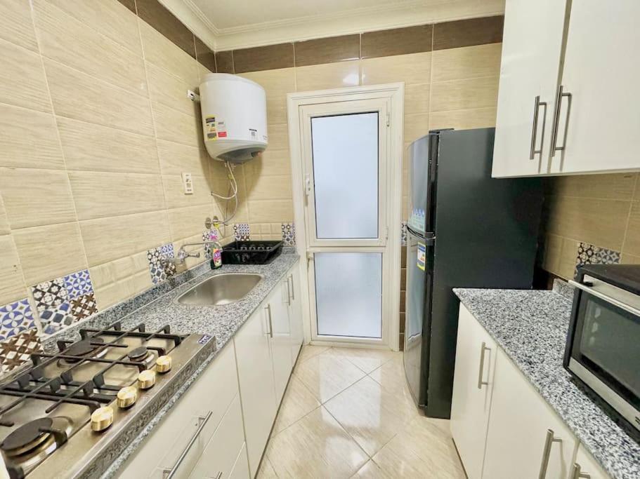Modern2BR Amazing GardenView & Self Checkin at Madinaty