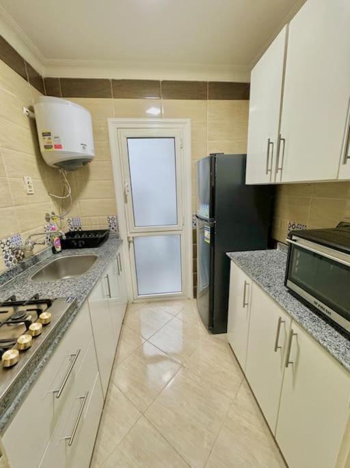 Modern2BR Amazing GardenView & Self Checkin at Madinaty