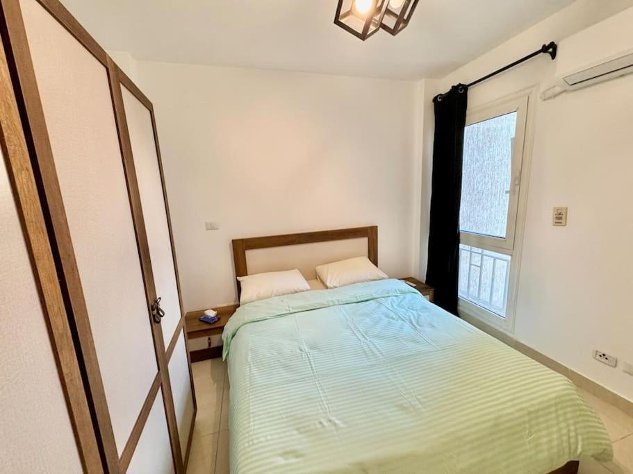 Modern2BR Amazing GardenView & Self Checkin at Madinaty