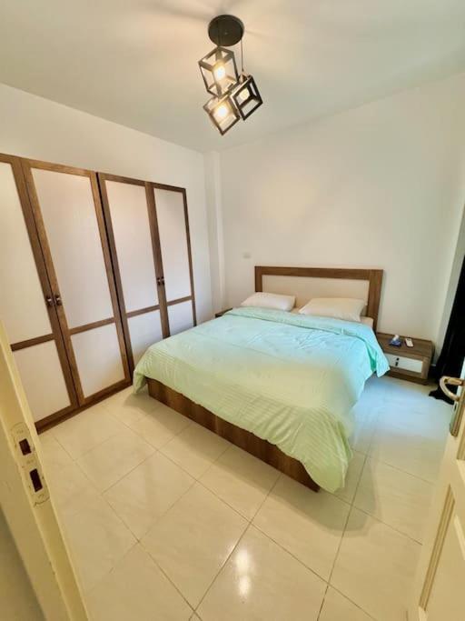 Modern2BR Amazing GardenView & Self Checkin at Madinaty