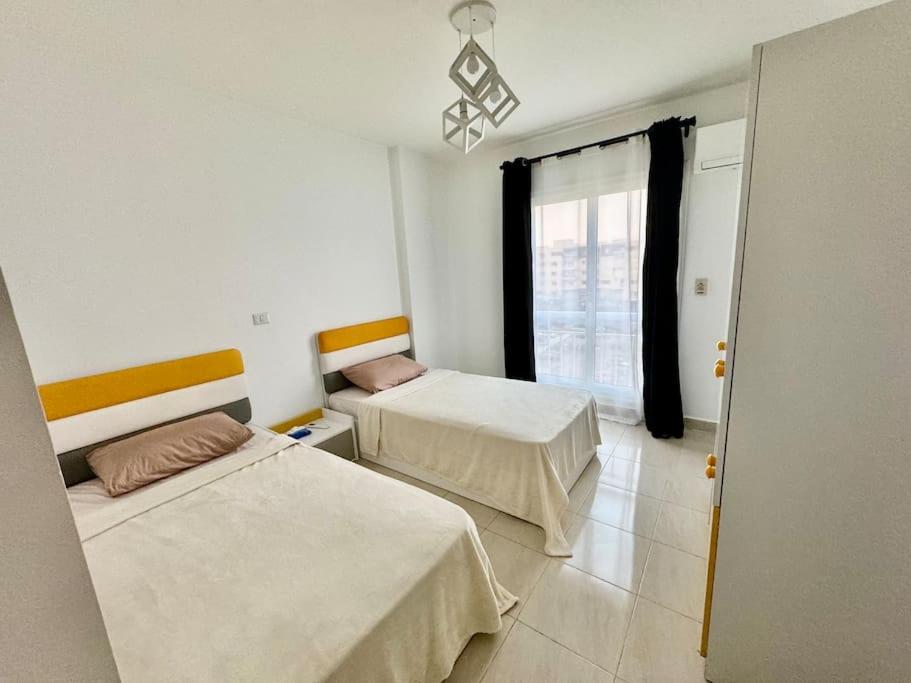 Modern2BR Amazing GardenView & Self Checkin at Madinaty