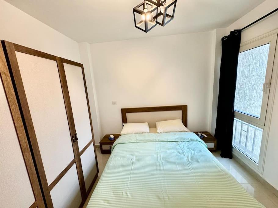 Modern2BR Amazing GardenView & Self Checkin at Madinaty