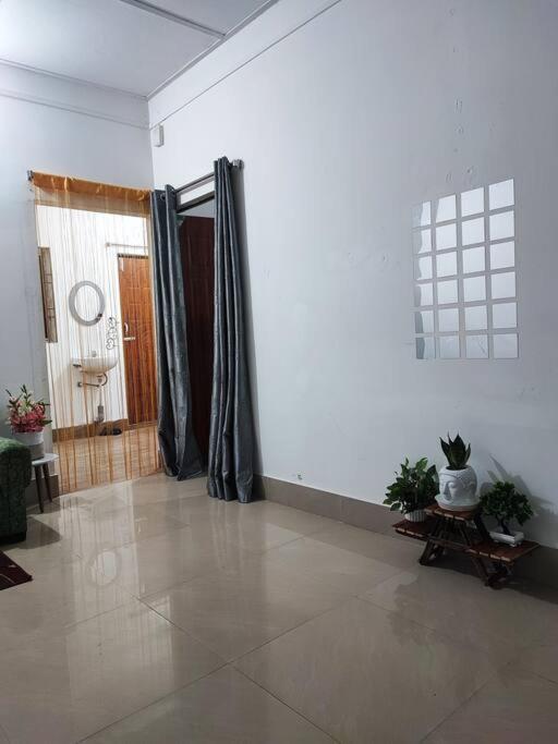 Greenwood Cabins Homestay, The Greenhouse view 4