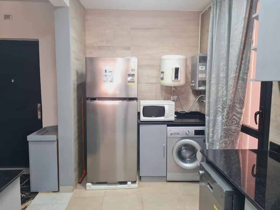 Supreme City Stay in Midtown Compound AUC Avenue