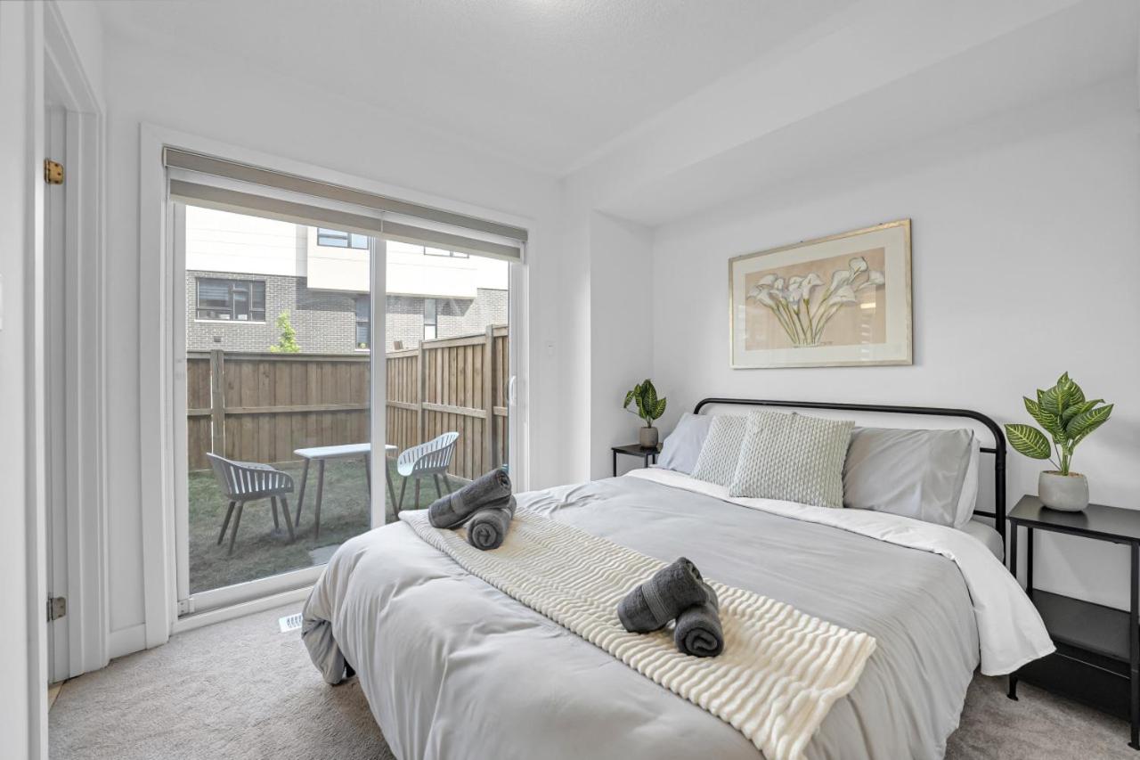 Posh 4 Bed Home with Backyard in Great Location