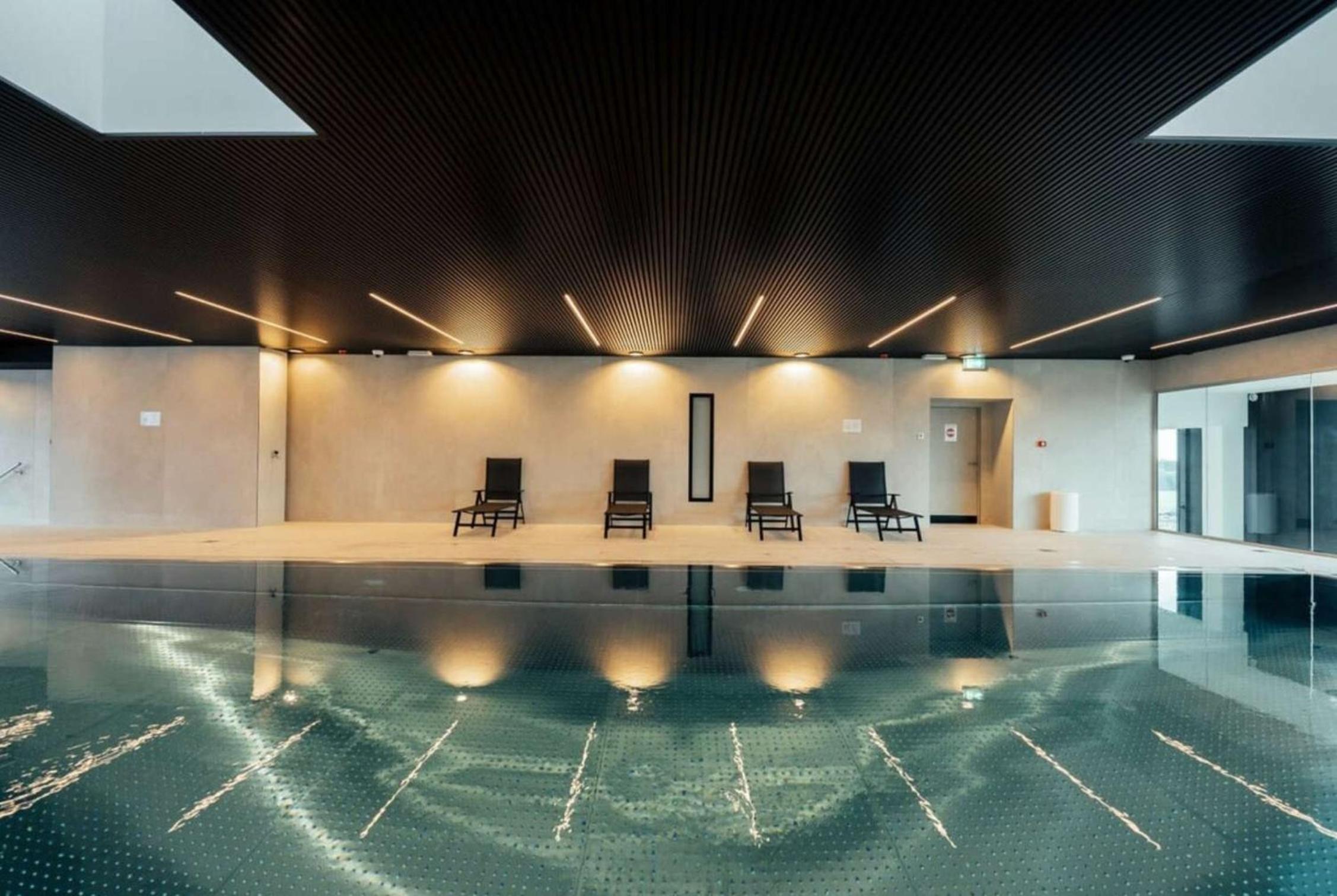 Modern 2BR Apartment with Pool & City Views view 2