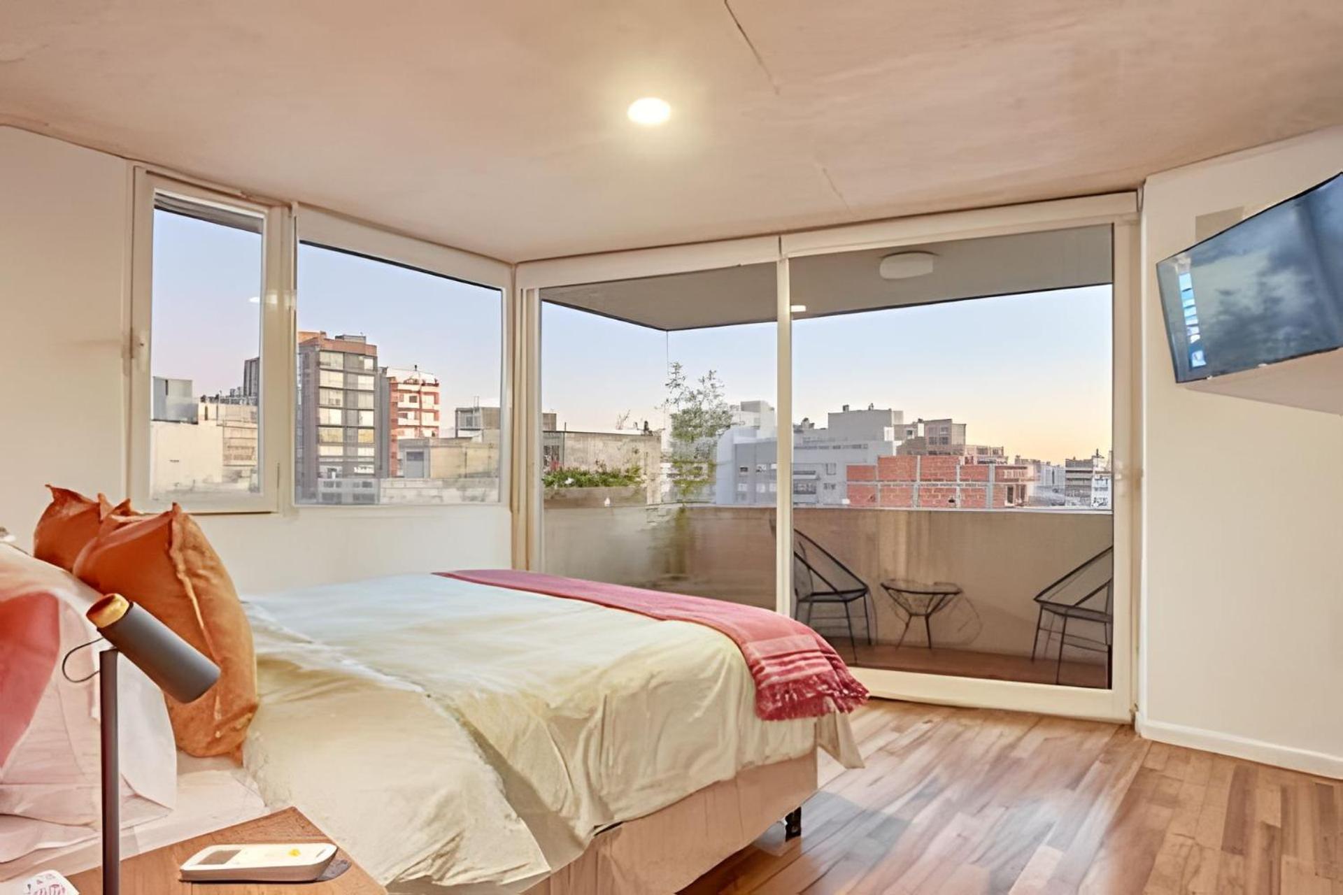 Moderno Penthouse con Terraza y Parrilla Privada