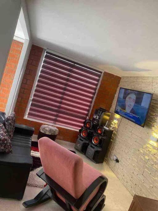 cómodo apartamento con ambiente de hogar