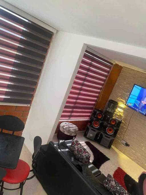 cómodo apartamento con ambiente de hogar