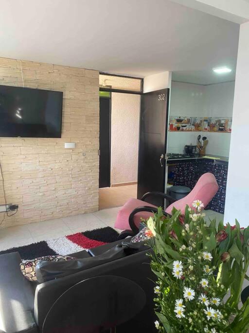 cómodo apartamento con ambiente de hogar