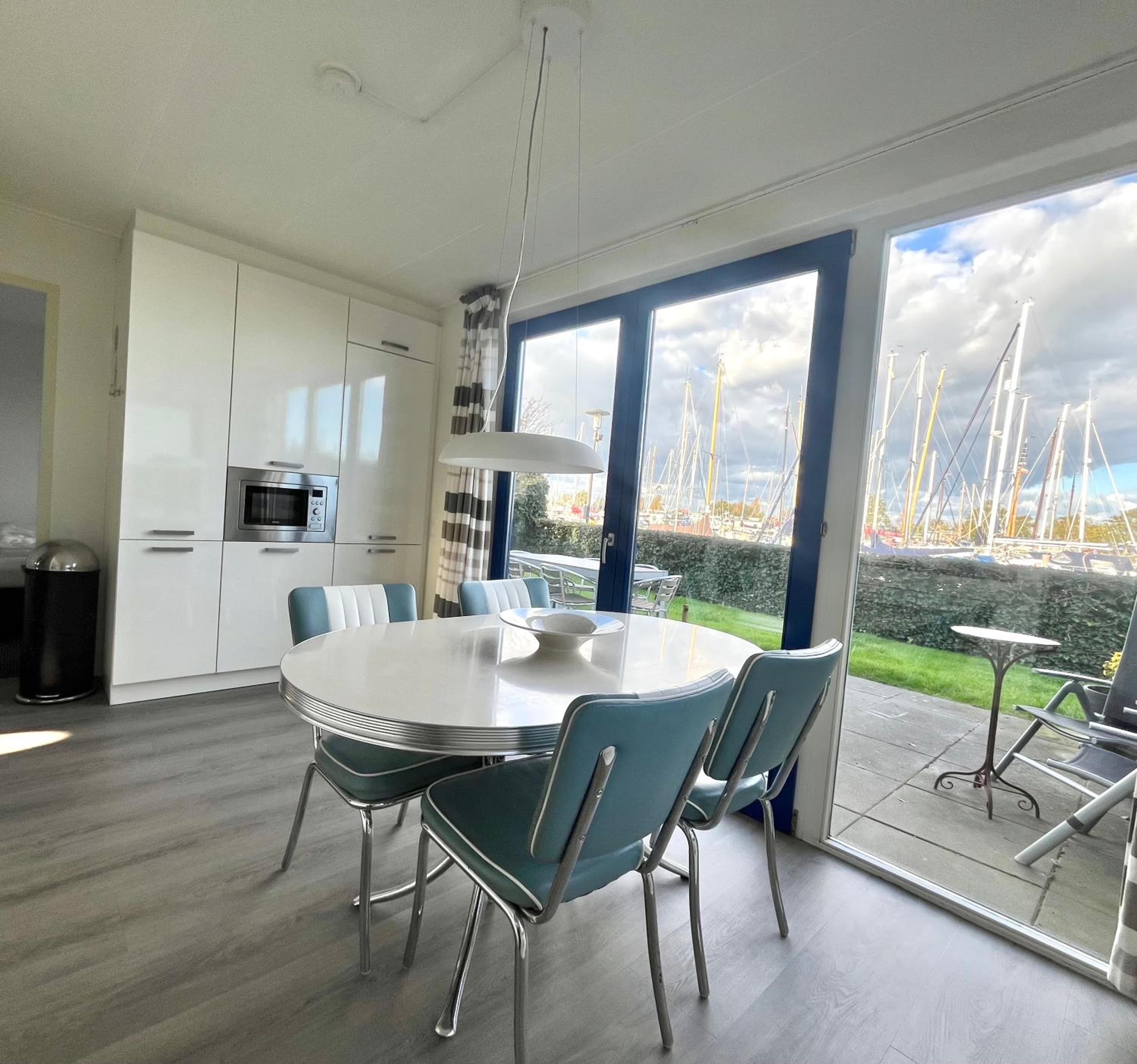 6pers Modern harbor house Jasmijn with fenced garden and lake view view 2