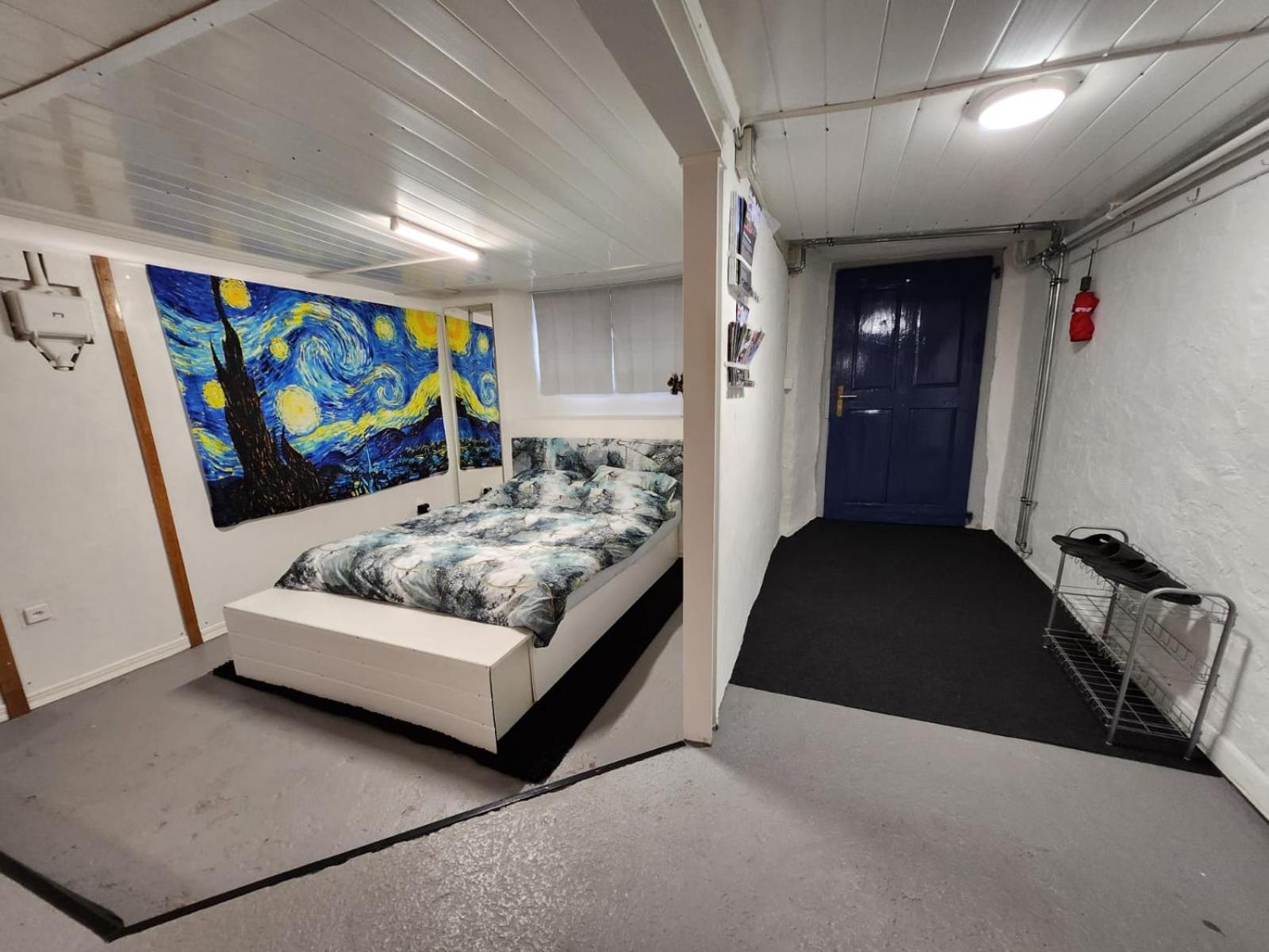 Spacious cellar studio surrounded by mountains and lake